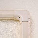 INABA DENKO SK-77-I Flat Elbow 90° SLIMDUCT Ivory Installed On Ivory Wall For Clean PVC Duct Routing