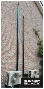 INABA DENKO SK-77-K Black PVC Flat Elbow 90° Installed On Brick Facade With SLIMDUCT Trunking System