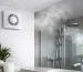 Humidity controlled bathroom extractor fan removing steam after a shower