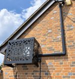 INABA DENKO SLIMDUCT SD-100-K Black Decorative Trunking System Installed On Facade For Air Conditioner Refrigerant Pipes
