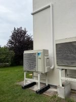 INABA DENKO SLIMDUCT White PVC Trunking System Installation On Facade For Protected HVAC Refrigerant Pipe Routing